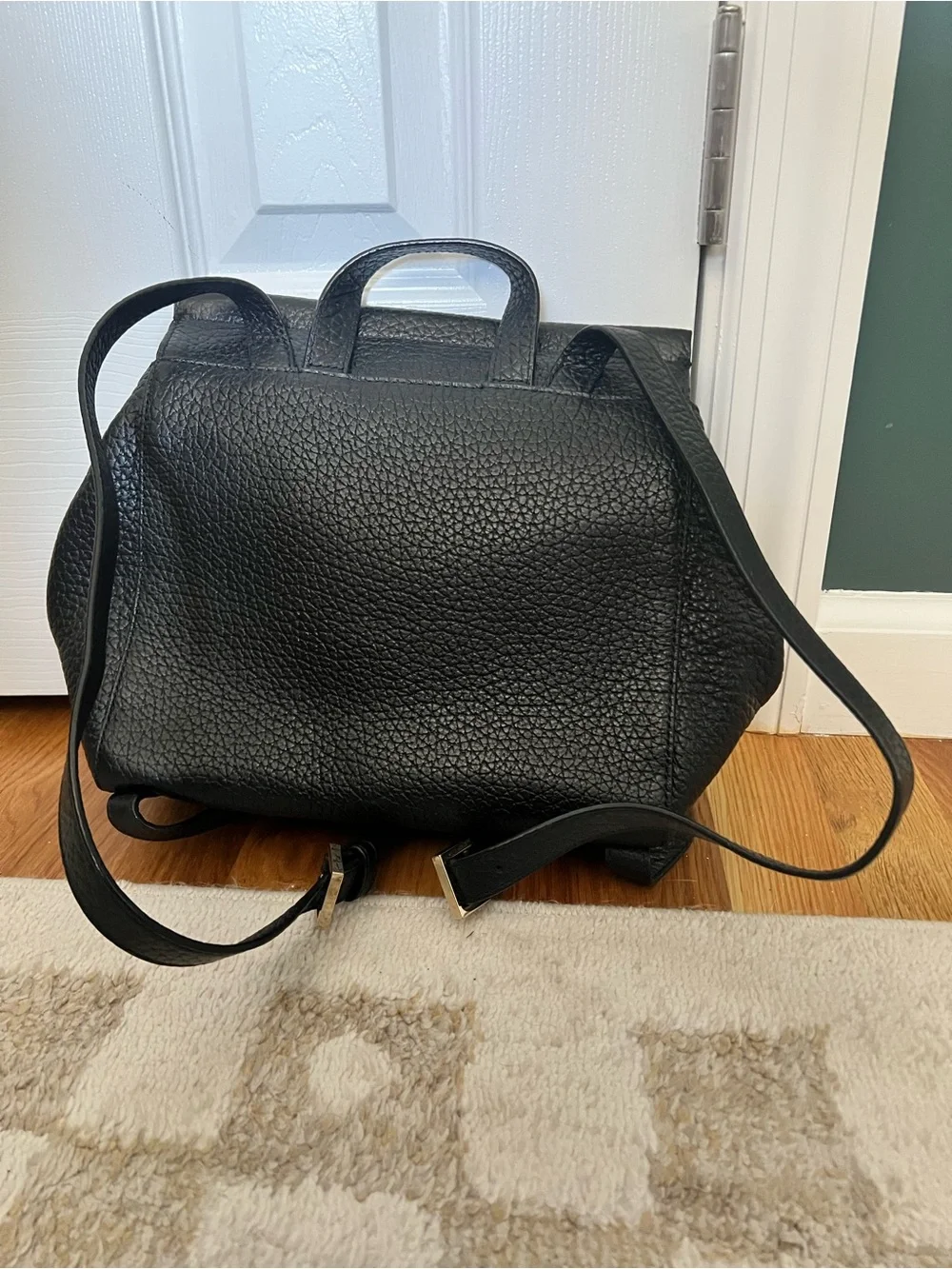 kate spade Black Pebbled Leather Backpack with Gold-Tone Turn Lock